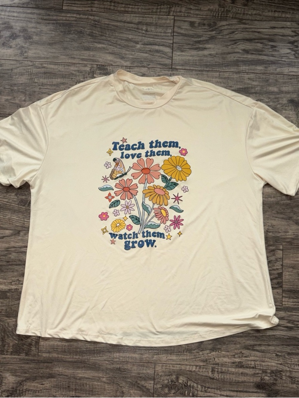 Graphic Tee with Floral 'Teach Them, Love Them' Design